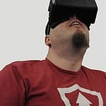 man with beard using VR